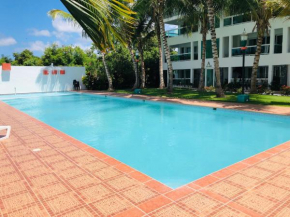 Sunny Confortable Apartment at the Caribe